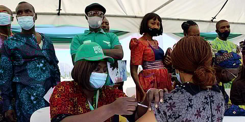 A woman receives an AstraZeneca coronavirus vaccine in Abuja, Nigeria. (Photo | AP)