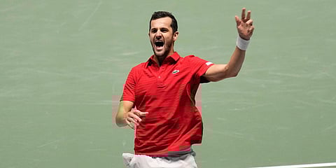 Croatia's Mate Pavic celebrates after winning against Italy during a Davis Cup men's doubles match at the Pala Alpitour in Turin. (Photo| AP)