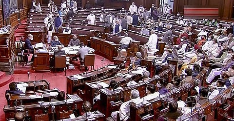 Opposition members walk out of the Rajya Sabha during the Winter Session of Parliament, in New Delhi. (Photo | PTI)