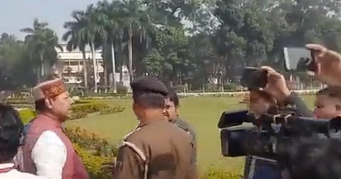 Scribes and police try to pacify RJD legislator Bhai Virendra (Photo | Twitter)