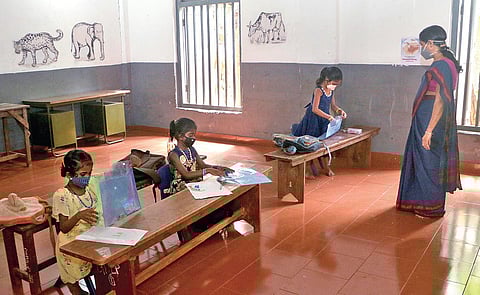 The class teacher gives lessons to students of Class 1 at Government Welfare LP School at Perambra, Kozhikode, on Wednesday | T P Sooraj