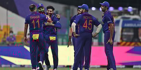 India's Ravindra Jadeja celebrates after taking a catch of Afghanistan's Karim Janat, a decision that was reversed by the third umpire during a T20 World Cup match in Abu Dhabi. (Photo| AP)