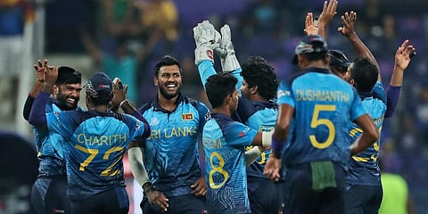 Sri Lankan cricketers celebrate the dismissal of West Indies' Roston Chase. (Photo | AP)