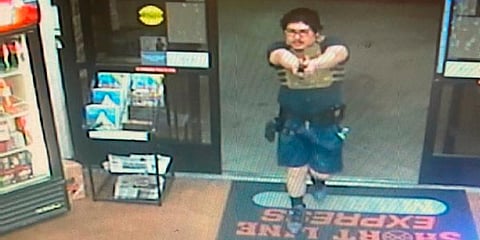 A homicide suspect, shot and killed a random man, then fired multiple times inside the Short Line Express Market, a Las Vegas convenience store near Jones and Robindale. (Photo | AP)