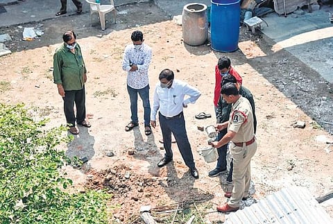 Police officials examine the site at Chatrinaka where a cracker explosion claimed two lives on Thursday night | Vinay Madapu