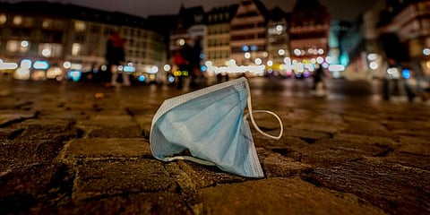 A face mask left on Roemerberg square in Frankfurt. (Photo | AP)