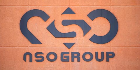 A logo adorns a wall on a branch of the Israeli NSO Group company. (Photo | AP)