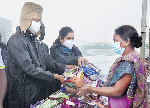 CM MK Stalin distributes relief materials at Aaduthotti Bridge in Saidapet, along with MP Thamizhachi Thangapandian | Express