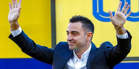 FC Barcelona's new coach Xavi Hernandez gestures during his official presentation at the Camp Nou stadium. (Photo | AP)