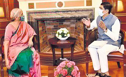 Andhra Pradesh Finance Minister Buggana Rajendranath Reddy calls on Union Finance Minister Nirmala Sitharaman in New Delhi on Monday. (Photo | Express)