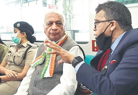 Kerala Governor Arif Mohammad Khan and Kochi Metro MD Loknath Behera travelling on a metro train on Monday | Express