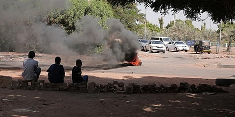 People burn tires in Khartoum, Sudan. (Photo | AP)