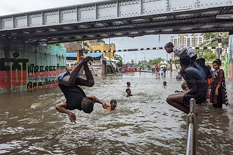 Children playing in the stagnated rainwater, Vyasarpadi subway, Nov 7, 2021. (Photo | Debadatta Mallick, EPS)