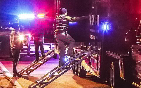 GBI agents and Clayton County police officers continue their investigation into a shooting that occurred in Clayton County (Photo | AP)