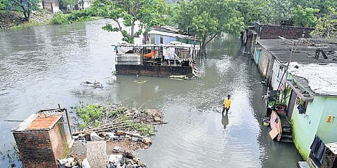 Radhakrishnan Nagar flooded with water from the Cooum, in Chennai on Tuesday | R Satish Babu