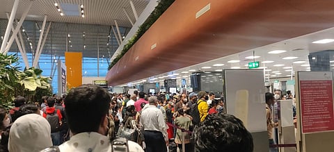 Chaos marked Day One of Covid tests being done for high-risk intl passengers at Auriga Research Centre inside the terminal of the Bengaluru airport. (Photo | Special Arrangement)
