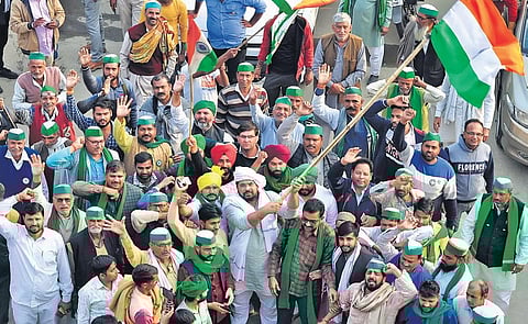 Farmers celebrate at Ghazipur after Centre accepted all their demands (Photo | Parveen Negi)