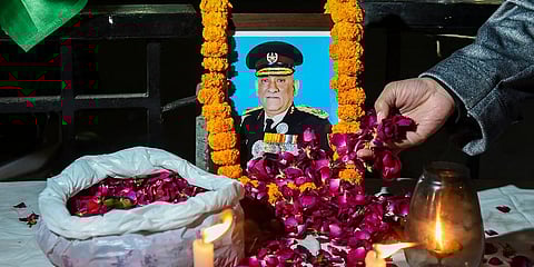 Floral tributes ebing aid to late Chief of Defense Staff (CDS) Gen Bipin Rawat in Srinagar. (Photo | PTI)