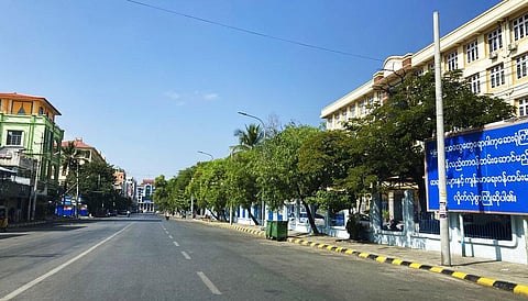 An empty street is seen Friday, Dec. 10, 2021, in Mandalay, central Myanmar. Streets were seen empty in Mandalay Friday as people participated in a 'silent strike'. (Photo | AP)