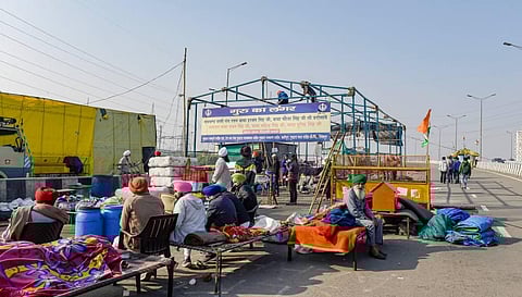Farmers prepare to leave from the Ghazipur border after their year-long agitation against contentious farm reform laws, in New Delhi. (Photo | PTI)
