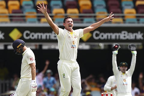 Australia's Josh Hazlewood appeals unsuccessfully for the wicket of England's Dawid Malan during day three of the first Ashes cricket test at the Gabba in Brisbane, Australia, Dec. 10, 2021. (AP)