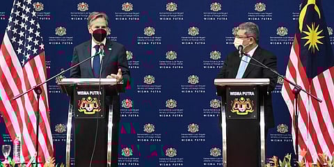 US Secretary of State Antony Blinken (L) speaks next to Malaysian Foreign Minister Saifuddin Abdullah during a press conference at foreign ministry in Putrajaya, Malaysia. (Photo | AP)