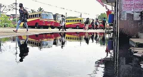 Dirty water flows from a nearby canal entering the KSRTC bus stand during a high tide, causing flooding