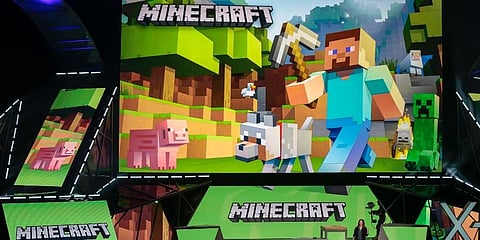 Lydia Winters shows off Microsoft's 'Minecraft' built specifically for HoloLens at the Xbox E3 2015 briefing before Electronic Entertainment Expo in Los Angeles. (Photo | AP)