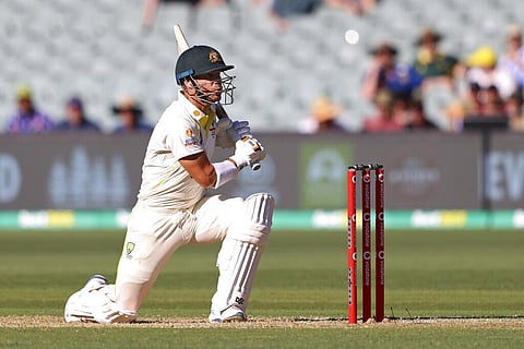 Australia's David Warner kneels while batting against England during their Ashes cricket test match in Adelaide. (Photo | AP)