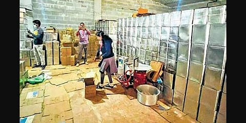 The godown where Nandini ghee was adulterated near Hosahundi in Mysuru on Thursday. (Photo | EPS)