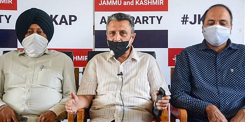 Jammu and Kashmir Apni Party General Secretary Rafi Ahmad Mir (C) along with senior party leaders address a press meet. (Photo | PTI)
