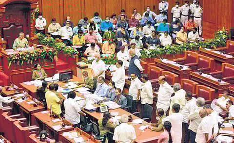 Congress MLCs protest in the well of the Council on Friday