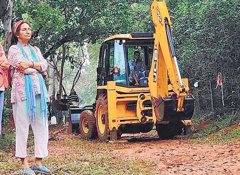 File picture of the day people protested against bulldozing of trees in Auroville
