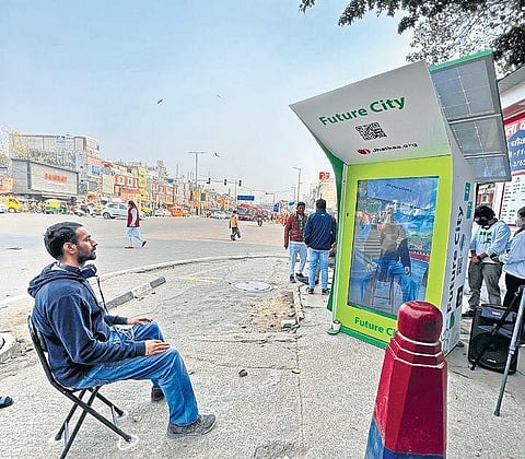 A person using the Future City installation.