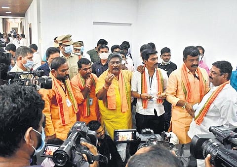 BJP corporators speak to the media over the manner in which the first physical meeting of the GHMC general body was held on Saturday, Dec 18, 2021. (Photo | Express, S Senbagapandiyan)