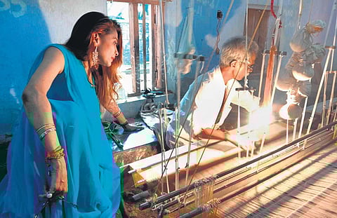 Fashion designer and movie maker Sanjana Jon at handloom unit at Balaramapuram