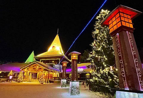 The Santa Claus Village tourist attraction lit with festive lights early in the morning in Rovaniemi, Finland Dec. 4, 2021. (Photo | AP)