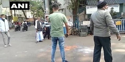 Crude bomb hurled outside a polling booth- Taki Boys School. (Photo | ANI)