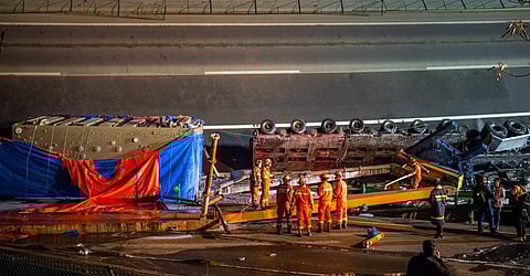 Three trucks on the bridge fell off it and one car was crushed under the debris, according to the official Xinhua News Agency, which cited local authorities. ( Photo | Twitter/ XH News)