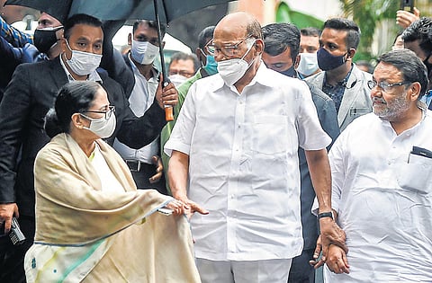 NCP president Sharad Pawar with West Bengal Chief Minister Mamata Banerjee after their meeting at his residence in Mumbai. (Photo | PTI)