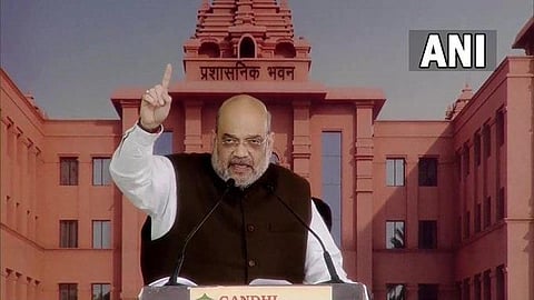 Union Home Minister Amit Shah addressing a rally after laying the foundation stone of Maa Shakumbhari University at Punwarka village in Saharanpur. (Photo | Twitter/ANI)