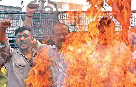 BJP workers stage a protest march to the Secretariat in Thiruvnanthapuram on Sunday. (Photo| BP Deepu, EPS)