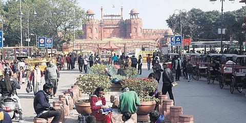 Groups of homeless people are a regular sight on the pavements at Chandni Chowk. often found in the middle of the road with their blankets, utensils and luggage in tow. (Photo | Parveen Negi, EPS)