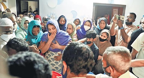 Slain SDPI leader KS Shan's wife Fanzila breaks down after his body was brought to their house at Ponnad near Mannanchery. (Photo| Arun Angela, EPS)