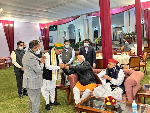 Union Minister Arjun Meghwal seeking blessings from the RSS chief Mohan Bhagwat. (Photo: Twitter)