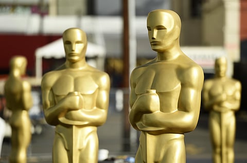 Oscar statues stand off of Hollywood Boulevard at the Dolby Theatre. (Photo | AP)