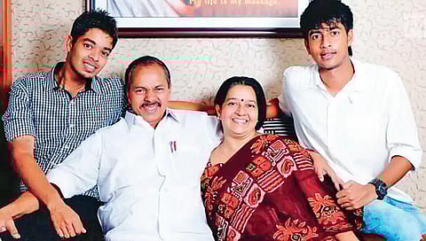 A family man, P T Thomas with wife Uma and sons