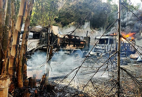 Smokes and flames billow from vehicles in Hpruso township,Myanmar, government troops rounded up villagers, fatally shot more than 30 and set the bodies on fire, reports said.(PHOTO | AP)