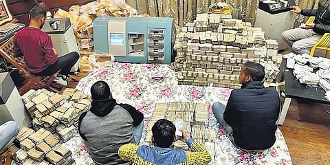 Officials keep a track of the unaccounted money in Kanpur. (Photo | PTI)