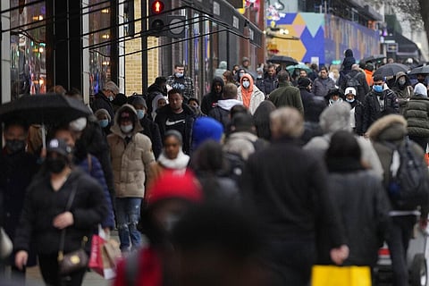 Shoppers wear face mask on Oxford Street in London, Friday, Dec. 24, 2021. (Photo | AP)
